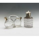 A cylindrical cut glass toilet jar with plain silver neck and shoulder and silver push-on lid 12cm