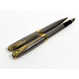 A Parker Sonnet sterling silver Gicele fountain pen with medium 18ct gold nib date code Q.III and