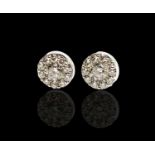 A pair of 18ct white gold Hearts On Fire Fulfillment diamond earrings the principle stone in each