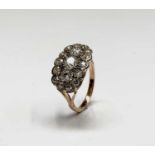 A Victorian style oval diamond ring set in rose gold. The head 18.3 x 11.9mm. 4.1gm