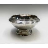 A handsome 'Barnards' silver bon-bon bowl, the pedestal foot and inverted rim decorated with