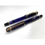 A blue Waterman Phileas fountain pen and matching rollerball pen