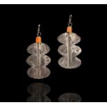 A pair of Breon O'Casey silver and stone earrings, each has a carnelian cylinder over a stamped