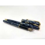 A Parker Sonnet Indigo fountain pen with 18ct gold medium nib empty cartridge and matching ballpoint