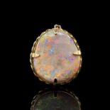 A gold-mounted opal pendant/brooch 44mm 17.9gm