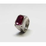 A signet style silver ring set a fuchsia pink stone.Condition report: Ring Size leading edge L 1/2