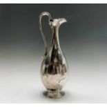 An elegant silver wine ewer by Edward & John Barnard with elaborate scrollwork decoration to the