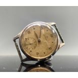 A gentleman`s Omega watch with 30 T2 PC cal. movement number 11050527 in Denisteel case number 13322