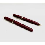 Sheaffer Prelude Royal Cranberry gold trim fountain pen with matching ballpoint. Boxed