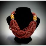 A coral and imitation amber necklace.