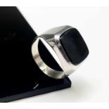 A classic gentleman's high purity white gold signet ring with vacant black onyx. 6.8gm