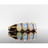 A 9ct gold five stone Victorian style opal ring 4.1gmCondition report: Settings and stones secure,