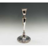 An impressive pair of silver candlesticks by Fordham & Faulkner with circular bases forming