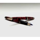 A red Waterman Phileas fountain pen and matching ballpoint