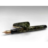 A Parker Victory green button fill fountain pen with 14ct N nib