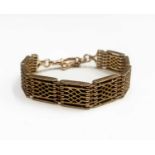 A 9ct gold fretwork link bracelet 36.7gm