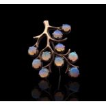 A 9ct gold tree brooch set with ten opals Height 40mm 6.1gm