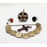 A Russian silver-gilt coin bracelet circa 1915, two craft silver rings, a silver pendant and a