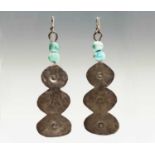 A pair of Breon O'Casey silver and stone earrings, each has a pair of turquoise beads over a