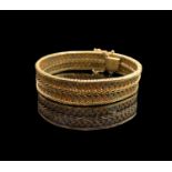 A 9ct three colour gold bracelet width 14mm 32.7gmCondition report: Length 18.8cm. Clasp working