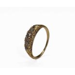 An 18ct (unmarked) gold Victorian style ring set with five diamonds 2.7gm