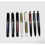 Pelikan Souveran M400. Four sets of fountain and ball point pens variously coloured green red blue