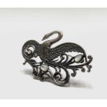 Silver stylised swan brooch set with mother of pearl.Width 6cm.