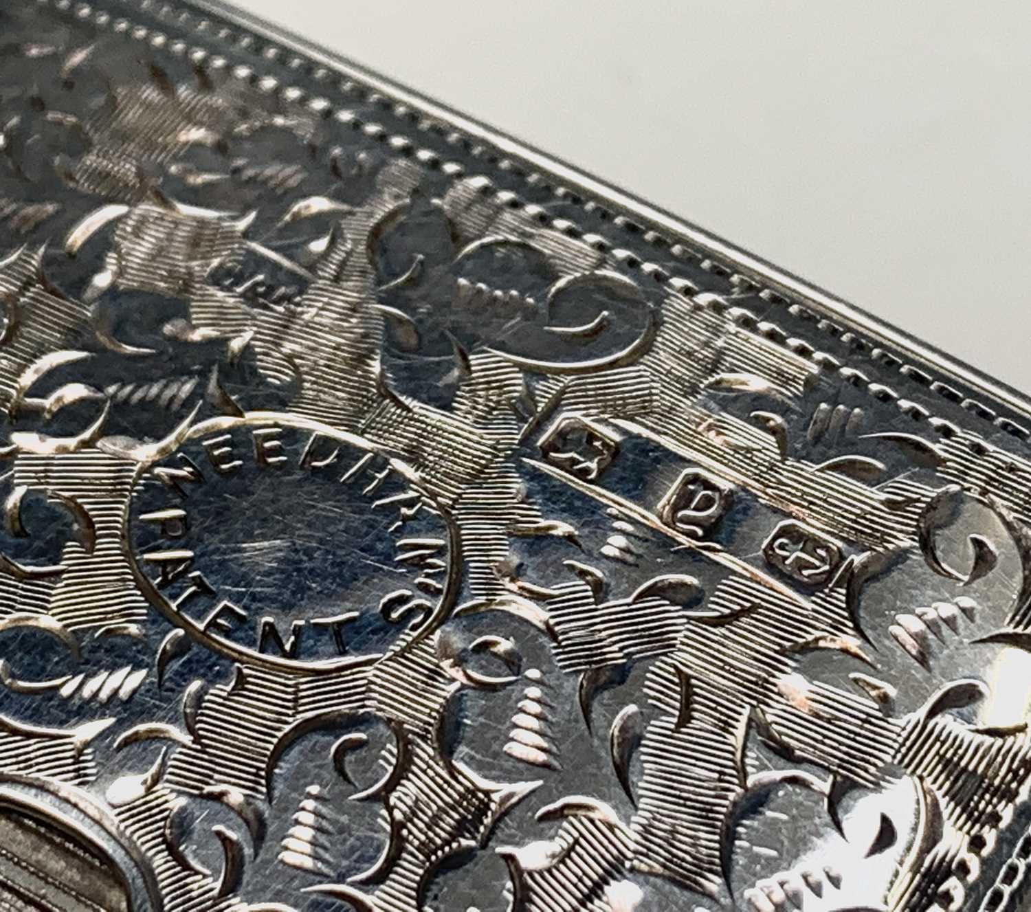 A silver 'Needhams Patent' card ejector card case.Engraved decoration and initialled central - Image 3 of 5