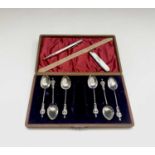 A set of six "Soldiers of the Queen" silver spoons, a silver bladed fruit knife and a silver