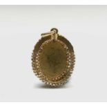 A good Victorian gold pendant set with turquoise and a central pearl width 25.3mm 14.8gmCondition