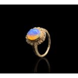 An opal and white stone cluster 10ct gold ring 3.7gmCondition report: Please note the white stones