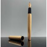 A Waterman L'Etalon Gold plated basket weave fountain pen with 18ct gold nib