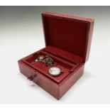 A ladies 9ct gold cased wristwatch, a South Crofty Tin pin, etc. in an Italian red leather tooled
