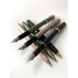 A matte black Scheaffer Prelude fountain pen and matching ballpoint and two other prelude pairs in