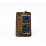 A 9ct gold ingot pendant mounted with two opal mosaic panels19.5gm