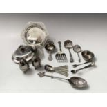 A set of six silver coffee spoons and a pair silver sugar tongs 2.8oz together with a Dutch silver