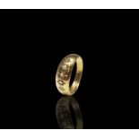 An 18ct gold ring gipsy set with five diamonds 3.5gmCondition report: Centre stone cleft