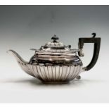 A Late Victorian bachelors silver Georgian style teapot Birmingham 1899 12.1ozCondition report: