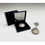 A Royal Mint James Bond 007 2020 Aston Martin One Ounce £2 Limited Edition Silver Proof Coin and a