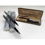A Forrest Green Parker 51 fountain pen, gold plated cap and another Parker 51, black together with