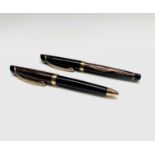 A Sheaffer Valor brown fountain pen with gold trim and 14ct gold nib together with a matching