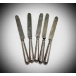 A set of five Victorian, Newcastle dessert knives with silver blades and filled silver handles.Marks