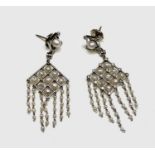 A pair of exquisite Belle Epoch platinum earrings of trellis form set with diamonds to the