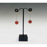 A pair of gold mounted carnelian bead earrings 5.8gmCondition report: Un hallmarked but tests as
