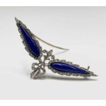 A Belle Epoch diamond set brooch with wings of fine lapis 57mm wide 7.5gmCondition report: The