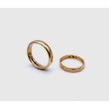A 22ct gold band 3.4gm and a 9ct gold band 5.2gmCondition report: 22ct ring size Q-Q1/29ct ring: