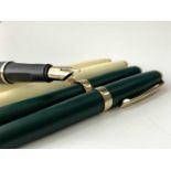 Three Scheaffer Prelude matte finish fountain pens, cream, green and blue together with two matte