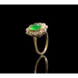 A cabochon emerald and diamond oval cluster ring 3.6gmCondition report: Approx size K-L,