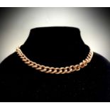A 9ct gold graduated curb link watch chain 54.8gmCondition report: Length 40cm This is a good