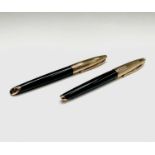 A Waterman Carene Delux deep green and gold fountain pen with 18ct gold nib and matching